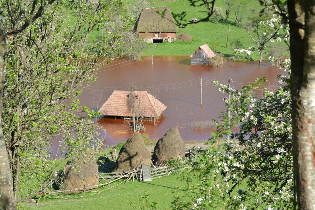 Houses submerged in toxic water, Geamăna village, Apuseni Mountains Romania